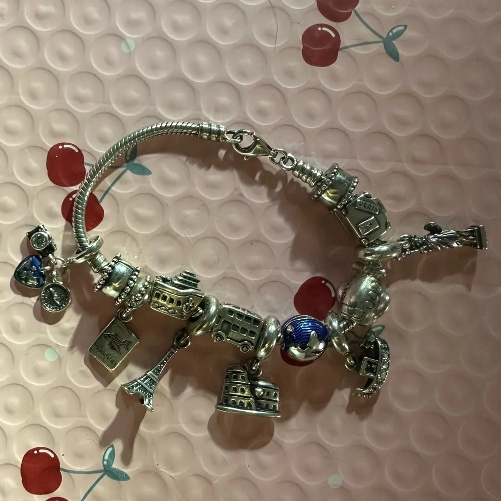 authentic Pandora Travelers charm bracelet. It’s a must have if u travel a-lot. - Picture 1 of 9